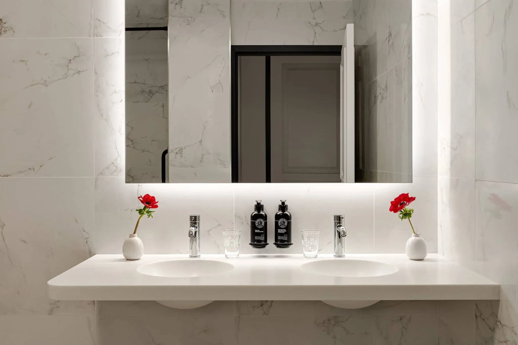 The Alchemy Suite's private bathroom provides a spacious bathroom to get ready in