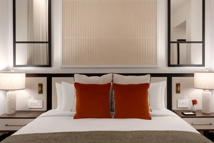 The Chemists' Club Hotel room decor combines upholstered headboards, meticulous details with warm lighting for a refined Midtown stay