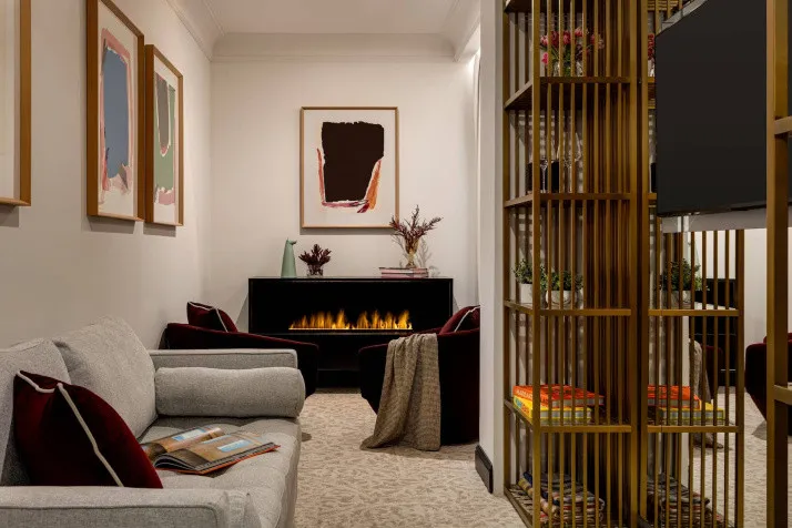 The sophisticated Penthouse at The Chemists' Club Hotel NYC features dramatic lighting and modern design in Manhattan